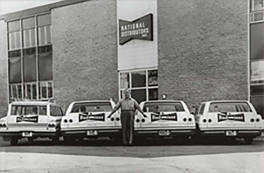 Frank in front of the National Distributors warehouse