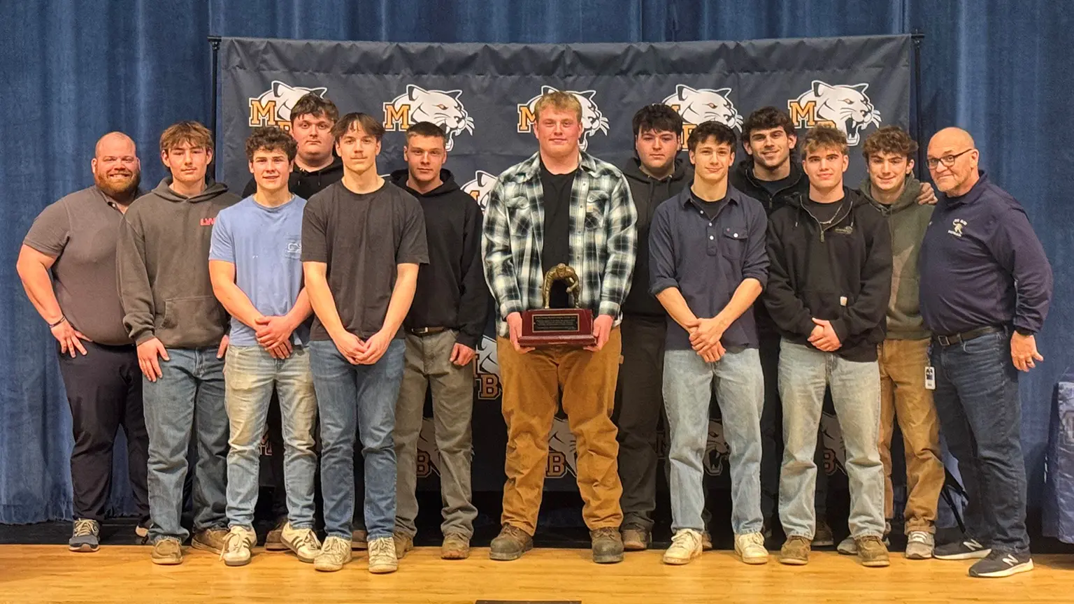 Joe Hayden with his team